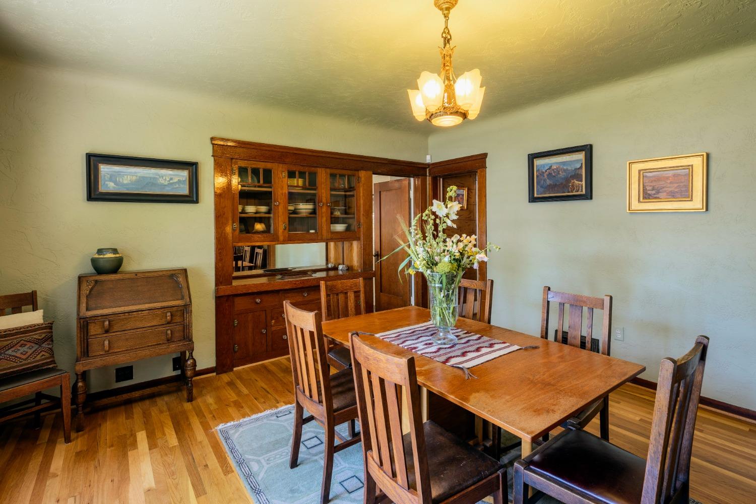 46 Pollasky Avenue Clovis, CA 93612 - Photo 17 of 69 a view of a dining room with furniture and wooden floor