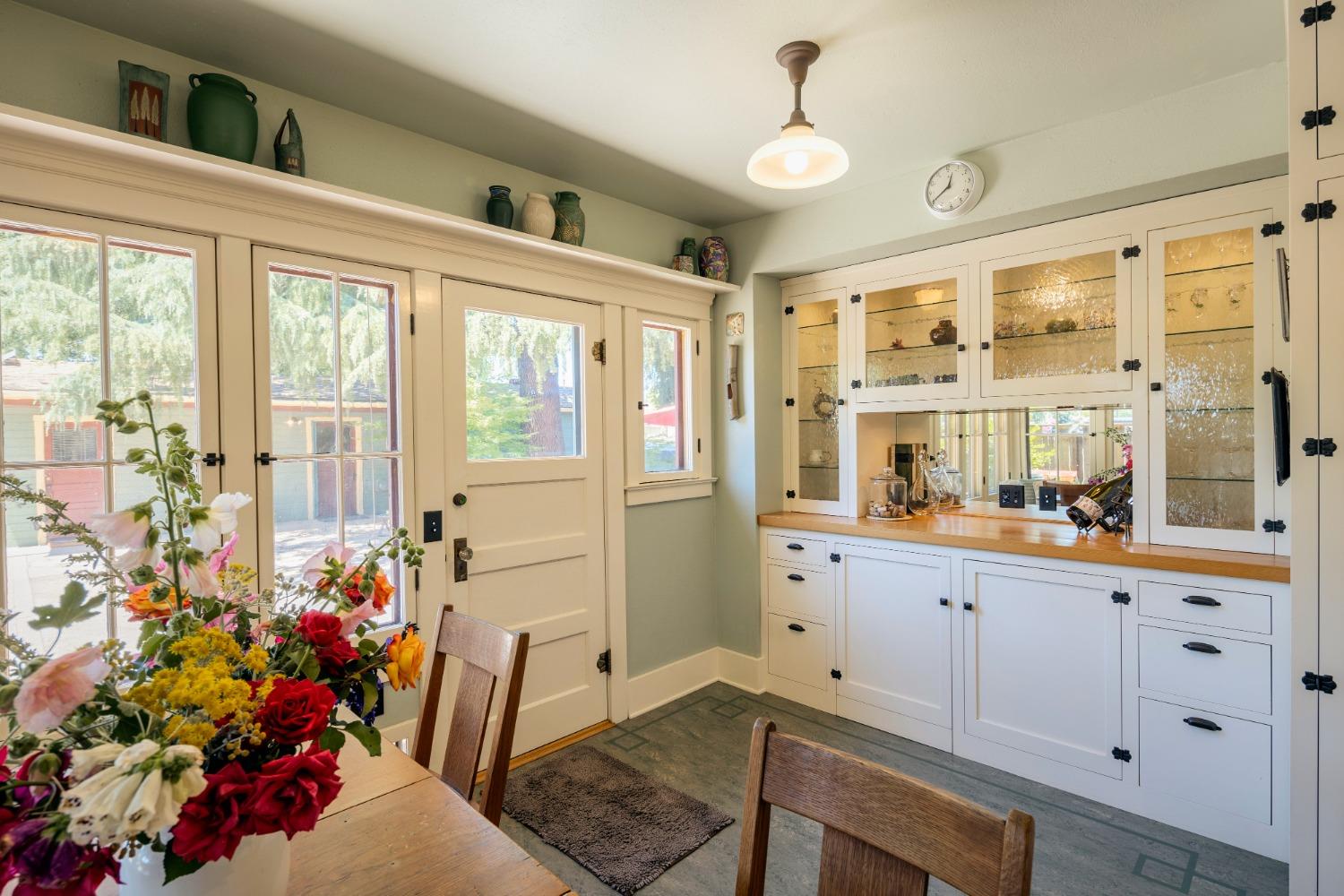 46 Pollasky Avenue Clovis, CA 93612 - Photo 21 of 69 a living room with furniture and flowers