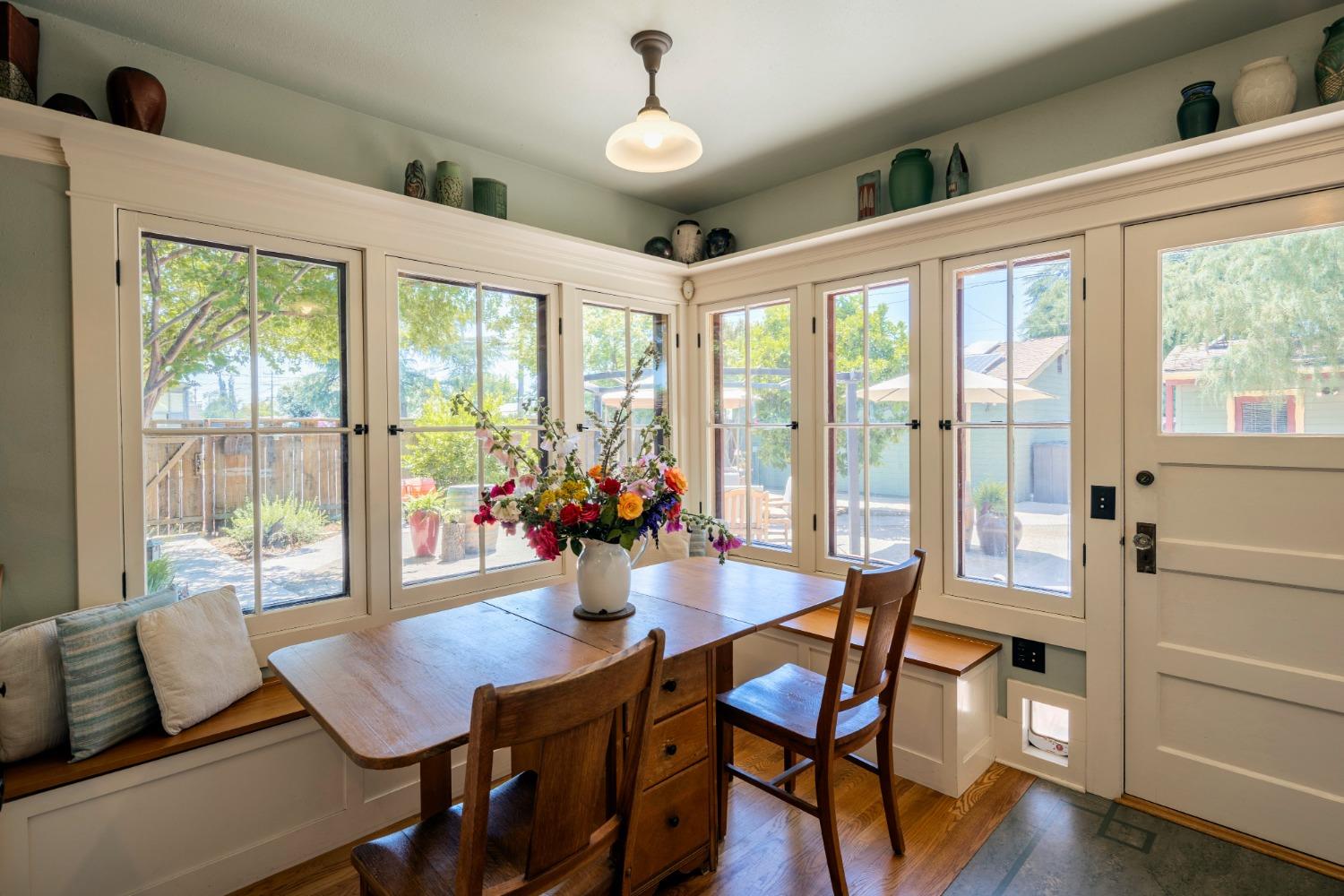 46 Pollasky Avenue Clovis, CA 93612 - Photo 23 of 69 a view of a dining room with furniture window and wooden floor