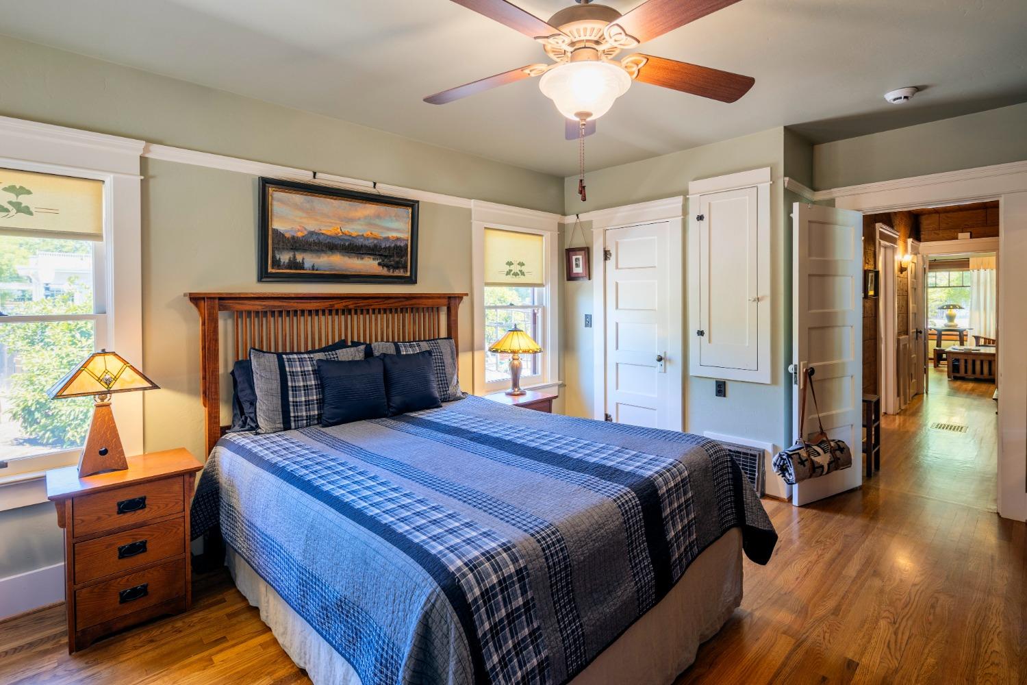 46 Pollasky Avenue Clovis, CA 93612 - Photo 26 of 69 a bedroom with a bed and wooden floor