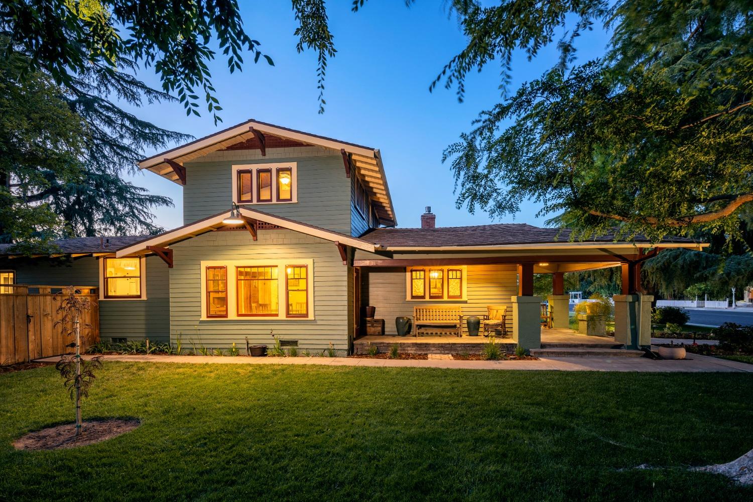 46 Pollasky Avenue Clovis, CA 93612 - Photo 3 of 69 a front view of a house with a yard