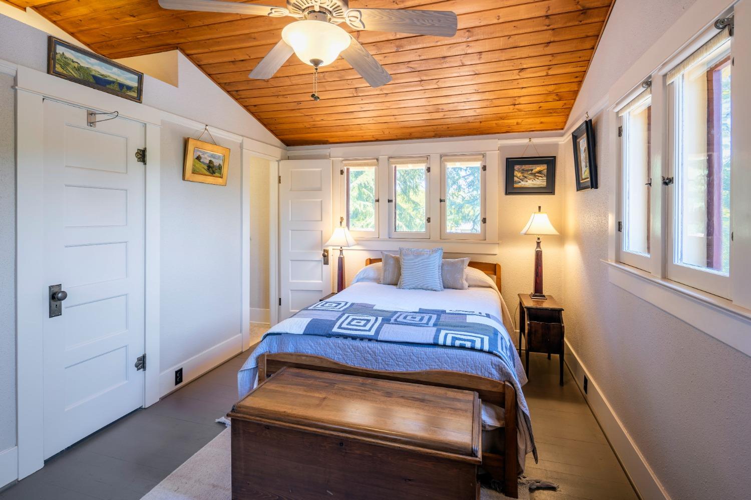 46 Pollasky Avenue Clovis, CA 93612 - Photo 31 of 69 a bedroom with a bed and wooden floor