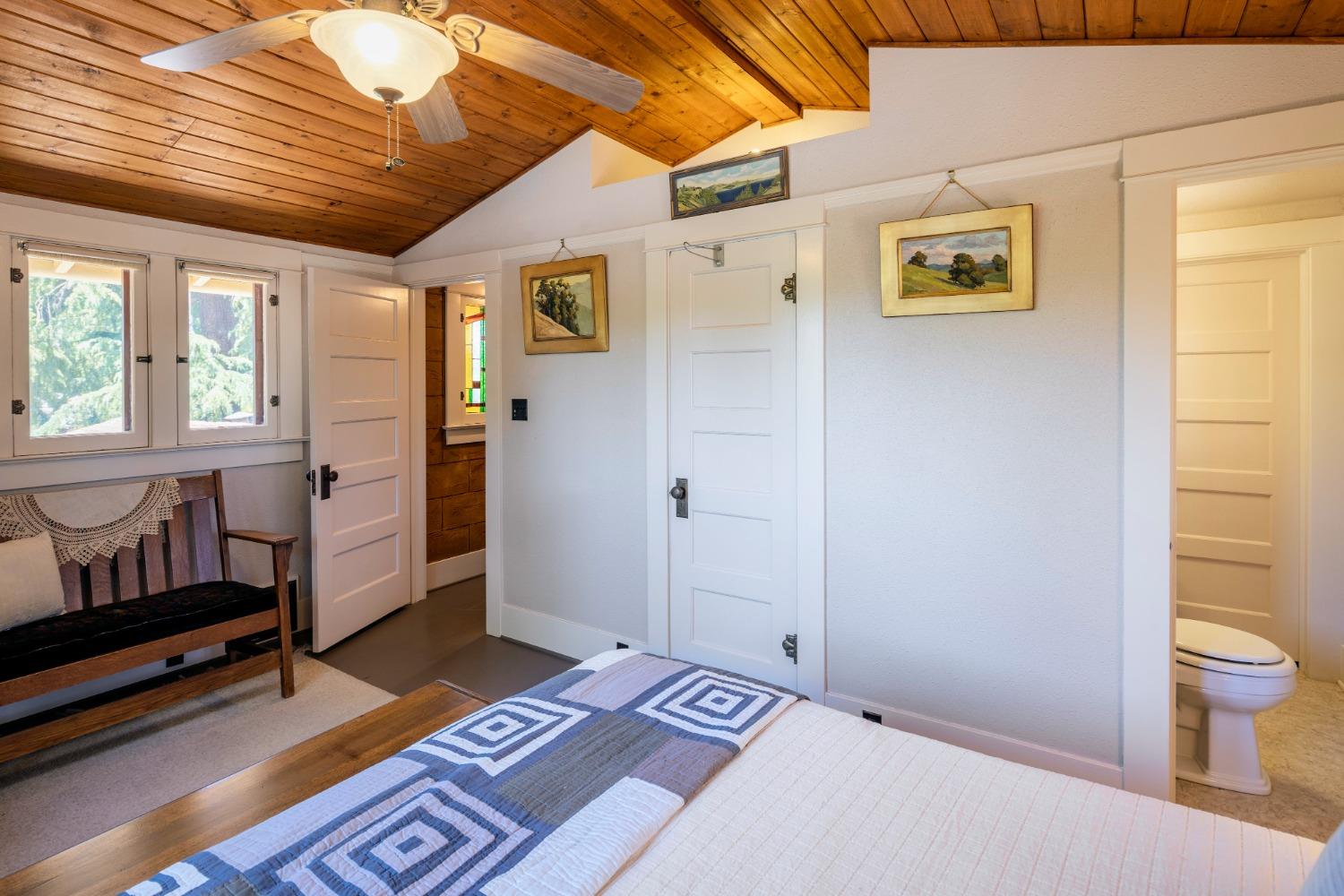 46 Pollasky Avenue Clovis, CA 93612 - Photo 32 of 69 a bedroom with a bed and wooden floor