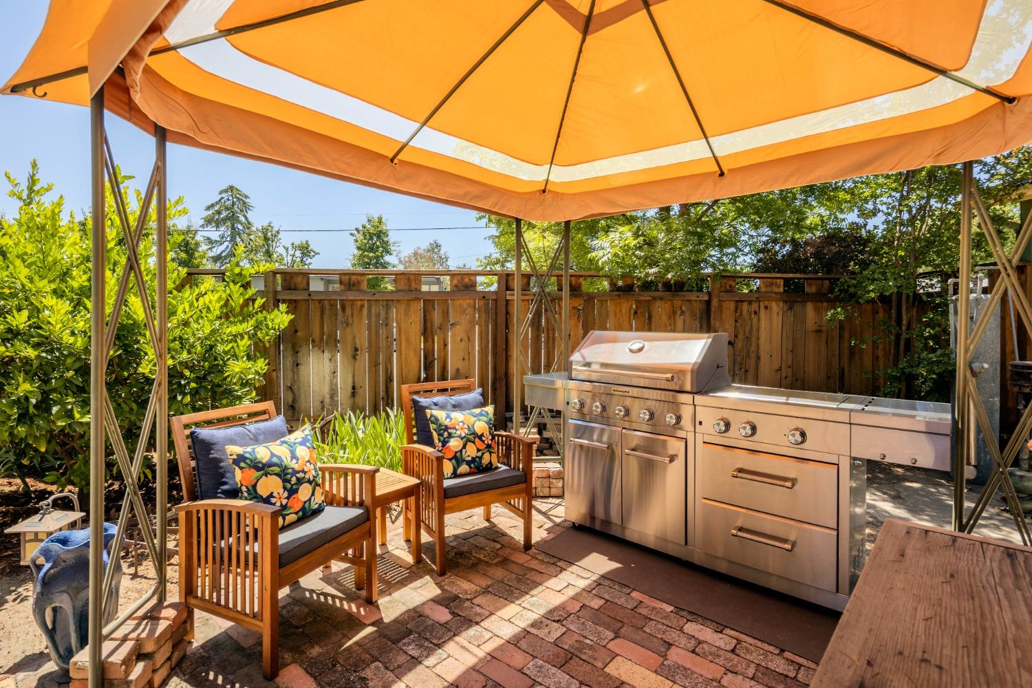 46 Pollasky Avenue Clovis, CA 93612 - Photo 38 of 69 a table and chairs in the patio