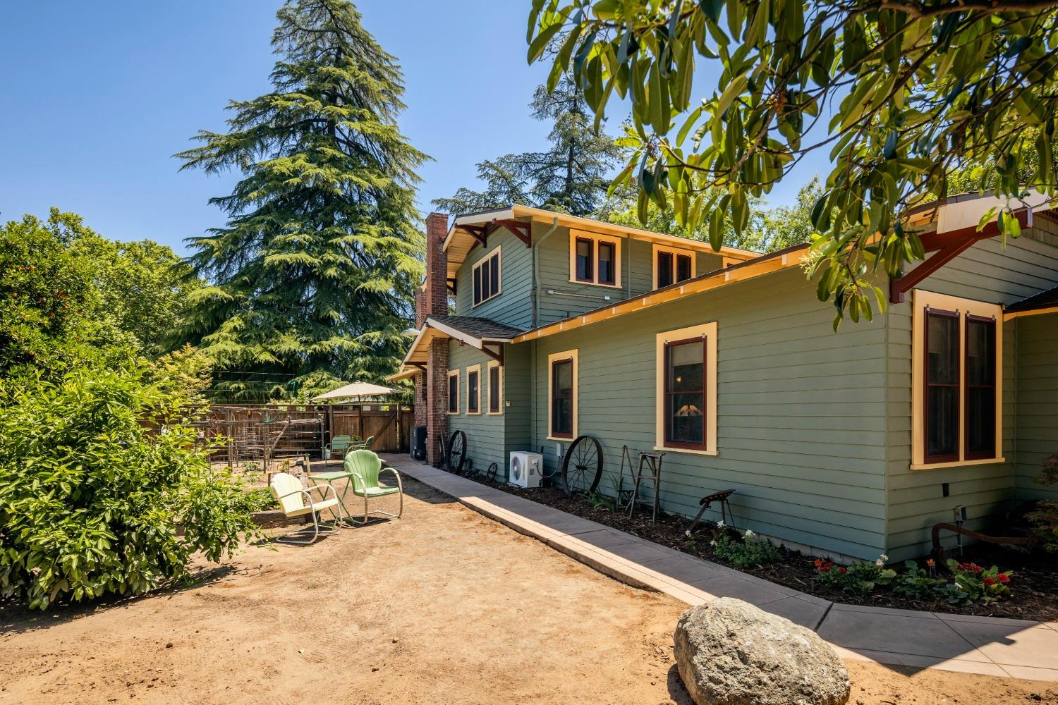 46 Pollasky Avenue Clovis, CA 93612 - Photo 41 of 69 a front view of a house with yard