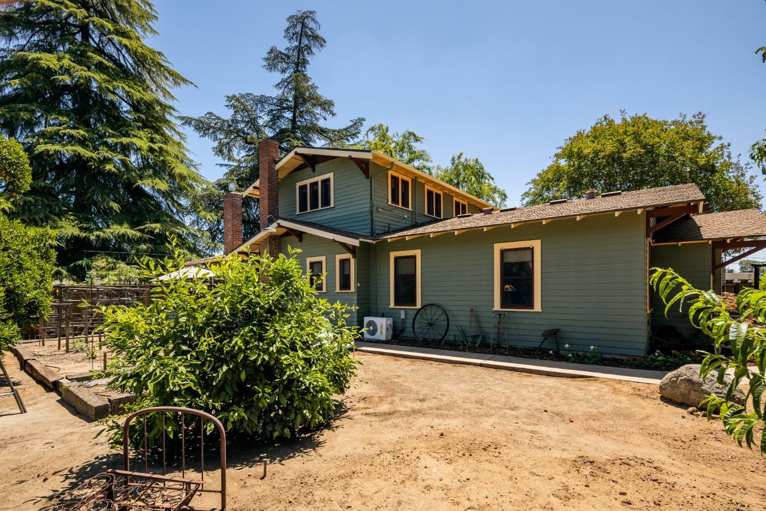 46 Pollasky Avenue Clovis, CA 93612 - Photo 45 of 69 a front view of a house with a yard