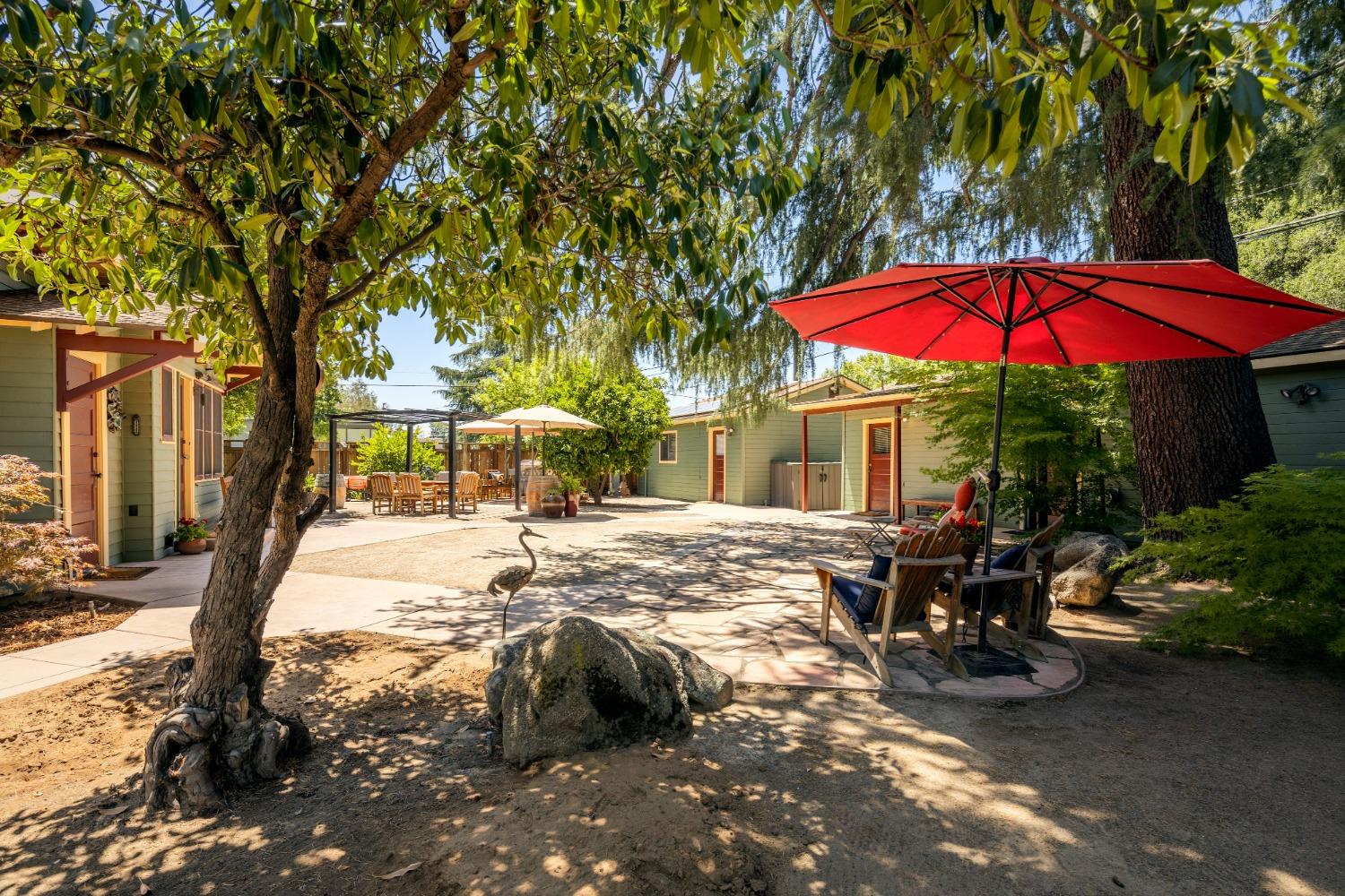 46 Pollasky Avenue Clovis, CA 93612 - Photo 46 of 69 a view of a house with backyard and sitting area