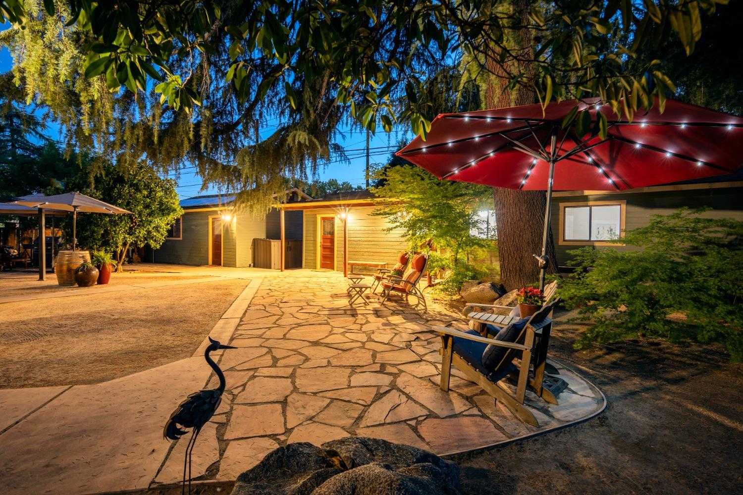 46 Pollasky Avenue Clovis, CA 93612 - Photo 56 of 69 a view of a chairs and table in the patio