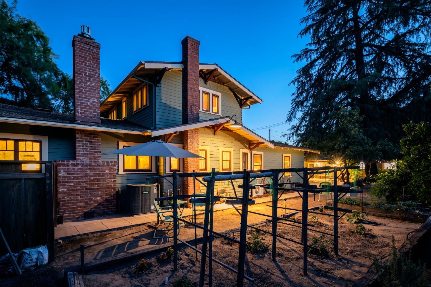 46 Pollasky Avenue Clovis, CA 93612 - Photo 64 of 69 a front view of a house with yard and staircase