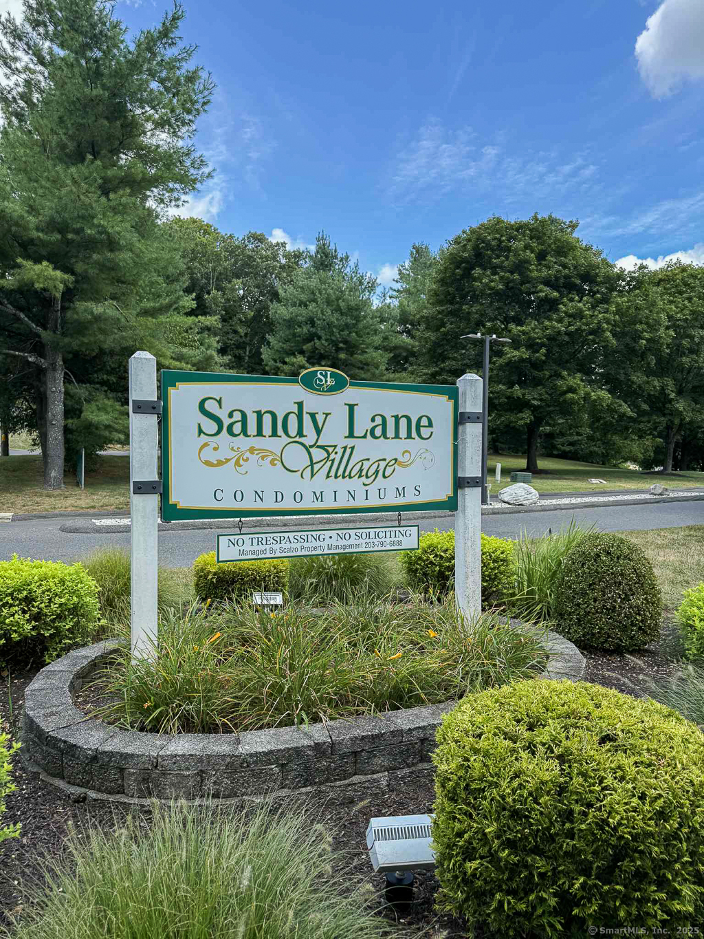 13 Homestead Lane, Unit 13 Brookfield, CT 06804 - Photo 1 of 1 a sign on the side of a building