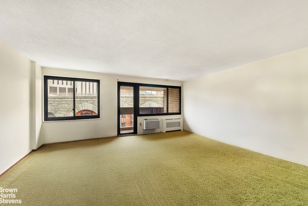 an empty room with window