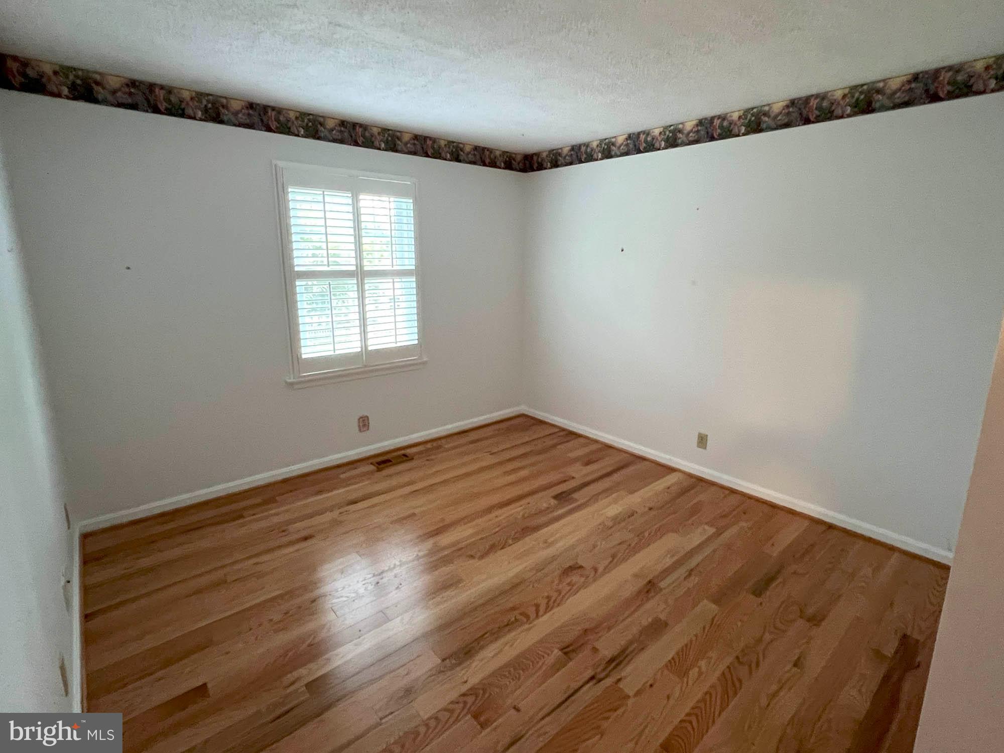7024 Sollers Point Road Baltimore, MD 21222 - Photo 11 of 22 a view of a room that has a window in it