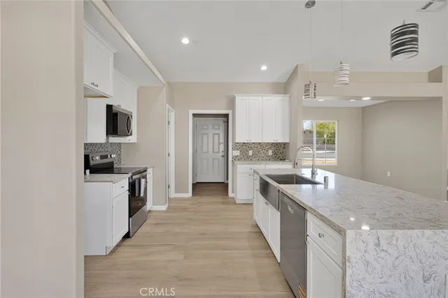 an empty room with a empty space and a window