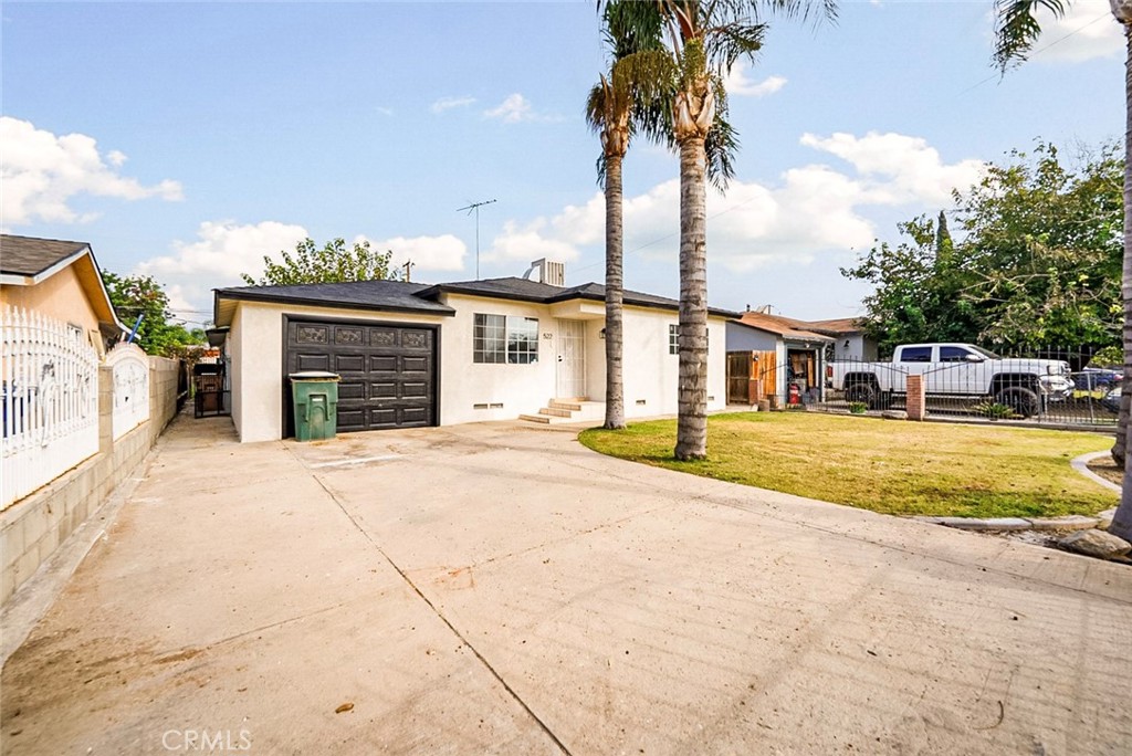 522 Price Street Bakersfield, CA 93307 - Photo 20 of 23 a house with swimming pool in front of it