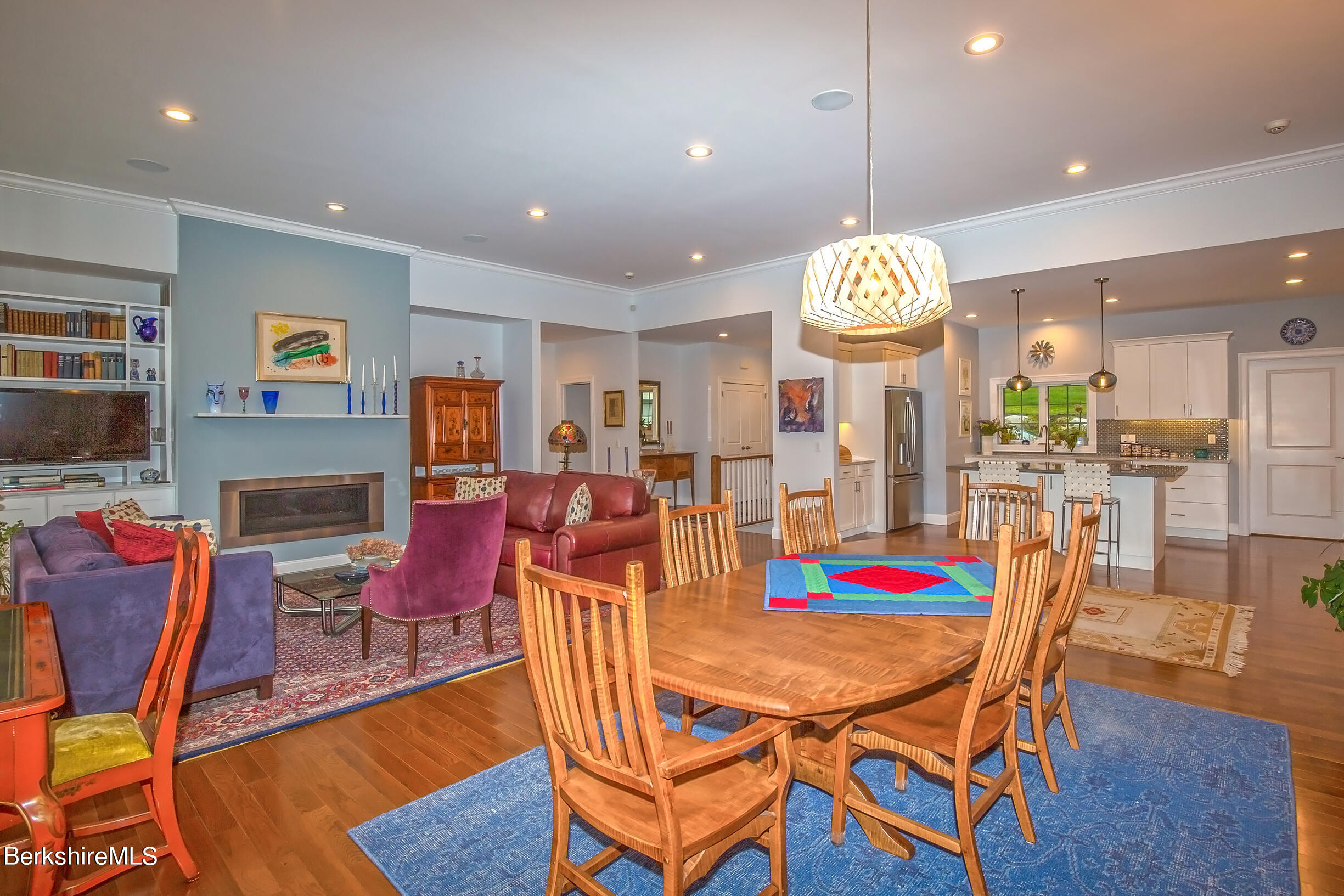 3 Burning Tree Road Great Barrington, MA 01230 - Photo 17 of 50 a view of a dining room with furniture a chandelier and wooden floor