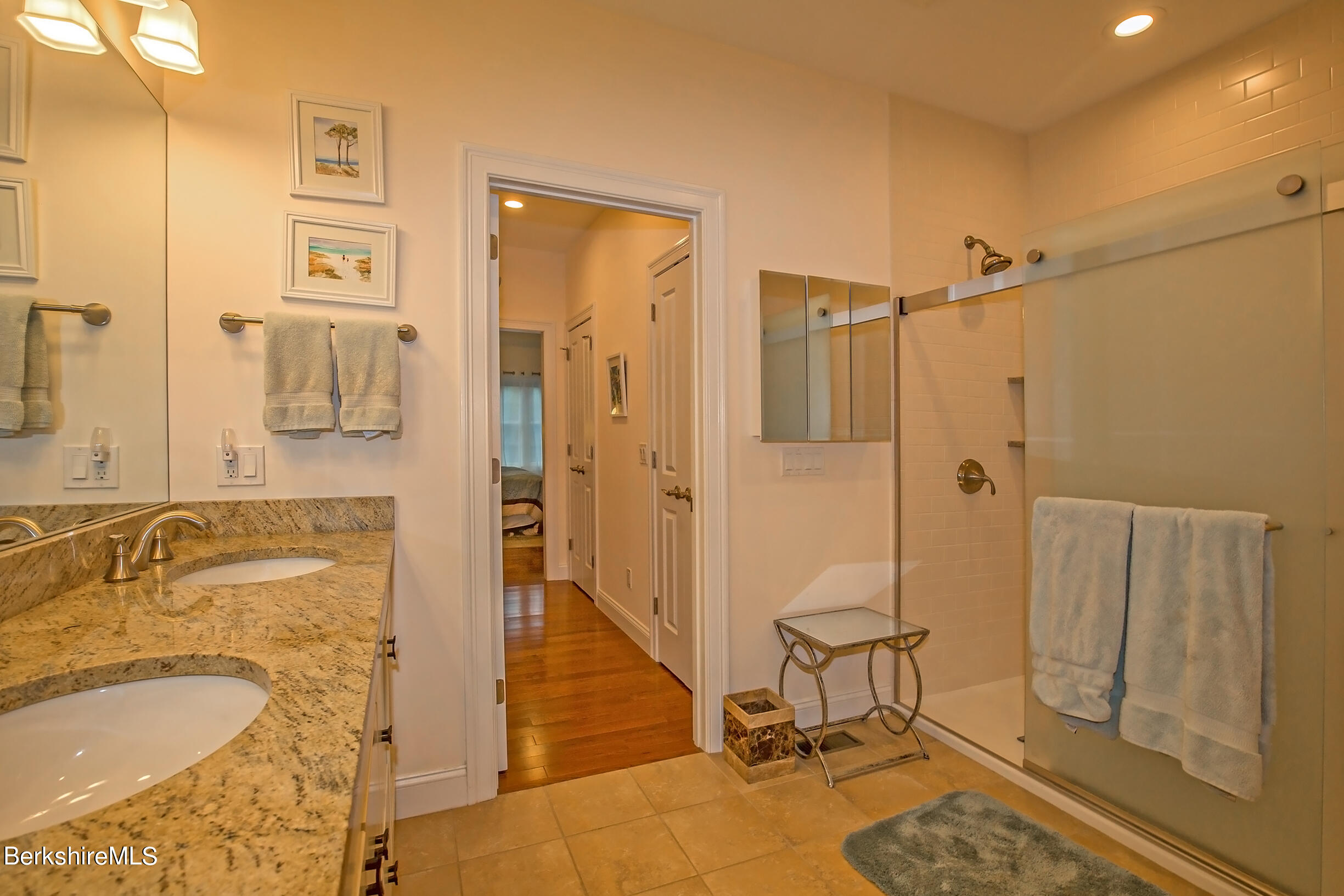3 Burning Tree Road Great Barrington, MA 01230 - Photo 24 of 50 a bathroom with a granite countertop sink mirror and shower