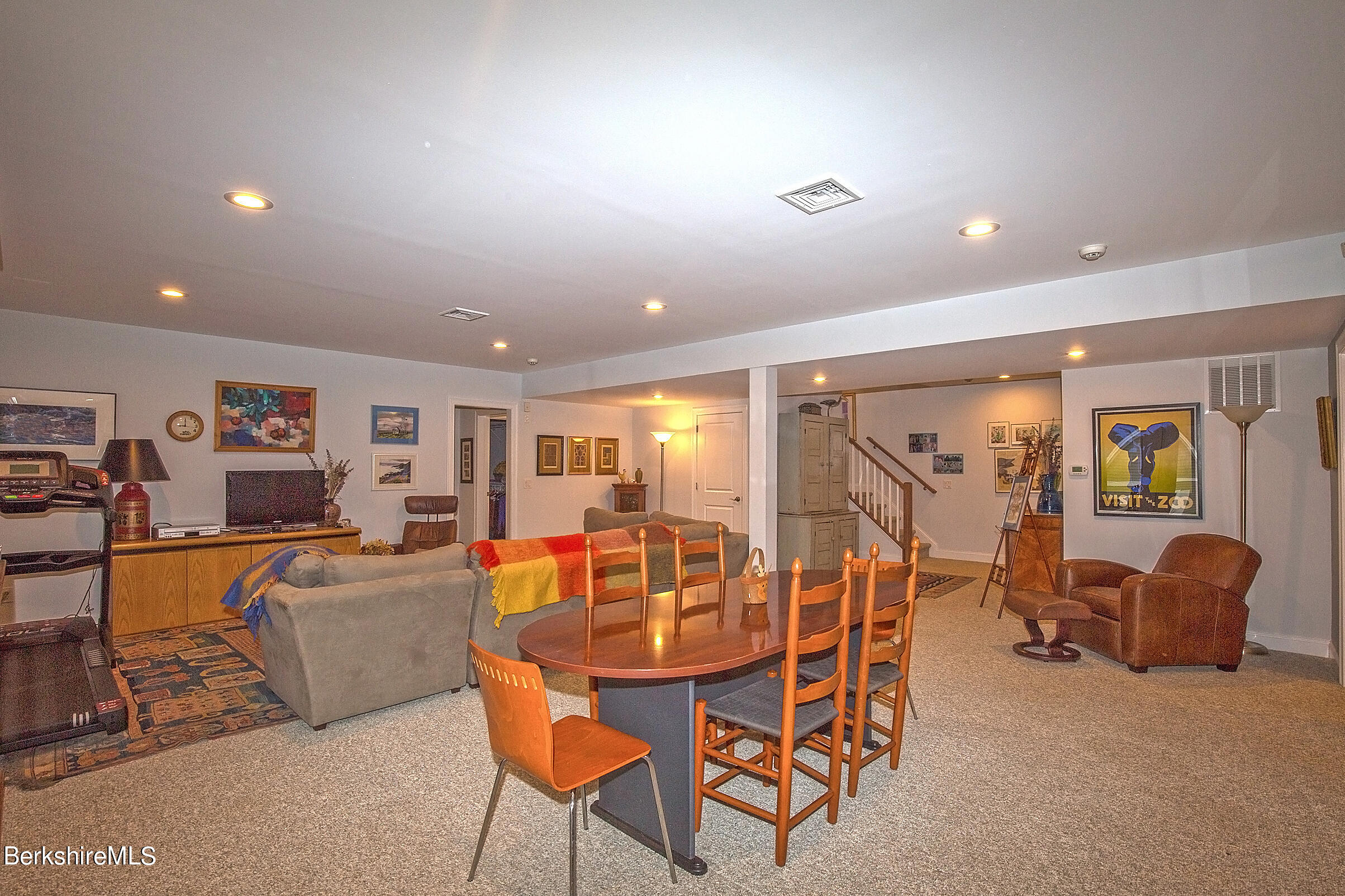 3 Burning Tree Road Great Barrington, MA 01230 - Photo 43 of 50 a living room with furniture and a flat screen tv
