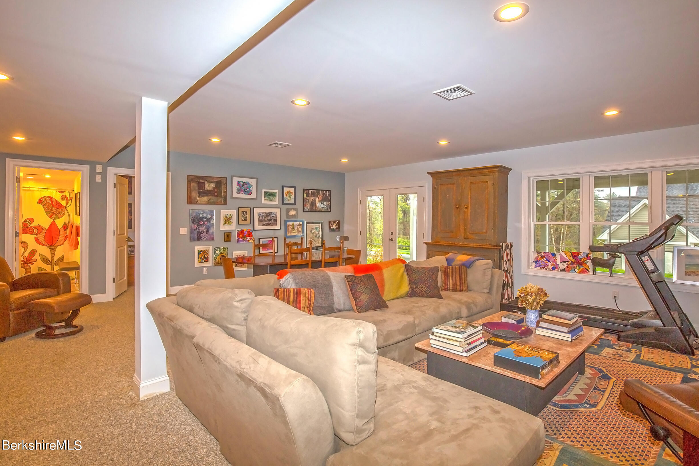 3 Burning Tree Road Great Barrington, MA 01230 - Photo 45 of 50 a living room with furniture and a flat screen tv