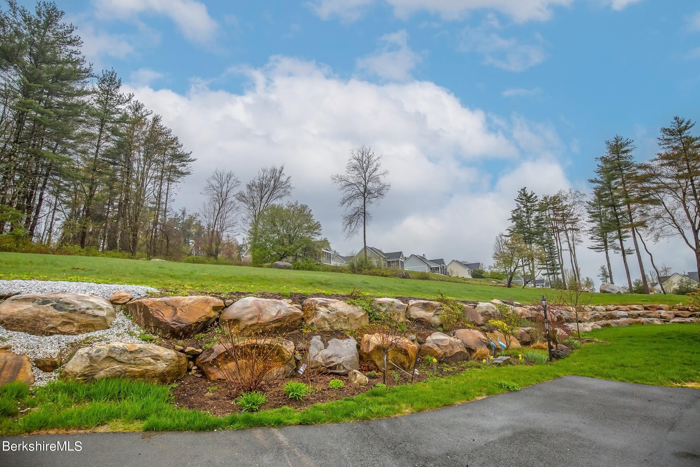 3 Burning Tree Road Great Barrington, MA 01230 - Photo 48 of 50 a view of a golf course with a lake view