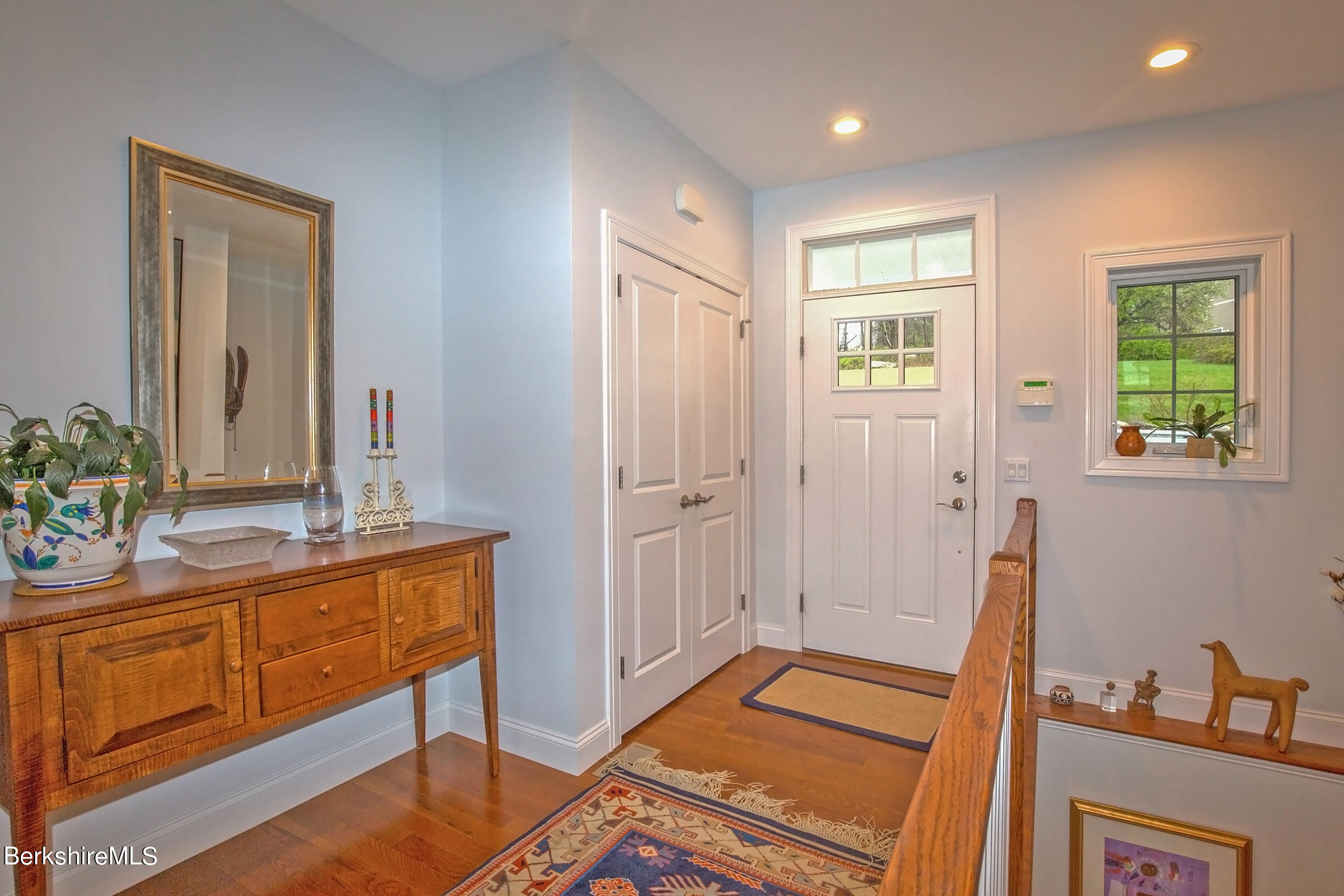 3 Burning Tree Road Great Barrington, MA 01230 - Photo 5 of 50 a view of a bedroom with furniture and wooden floor