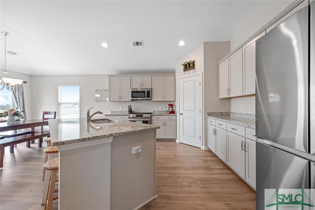 138 Whitehaven Road Savannah, GA 31407 - Photo 12 of 37 Stainless appliances and corner pantry.