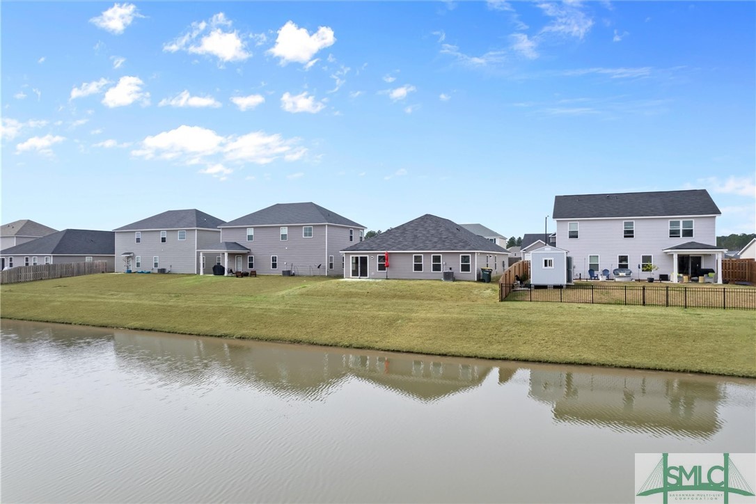 138 Whitehaven Road Savannah, GA 31407 - Photo 26 of 37 Relax on the patio with serene lagoon views.