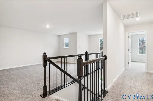 a view of a hallway with entryway