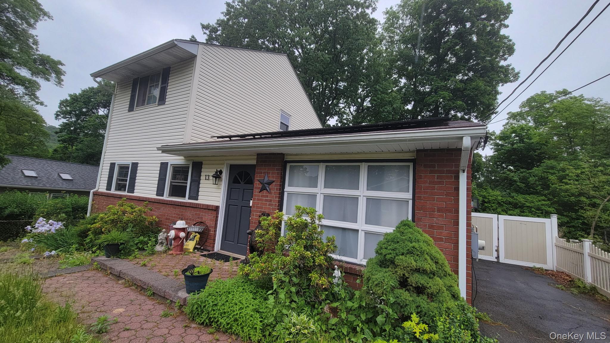 13 Murphy Road Fort Montgomery, NY 10922 - Photo 1 of 22 Split-level residence featuring a brick facade and light-colored siding