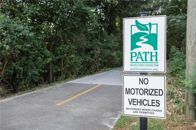 a sign that is on a brick wall