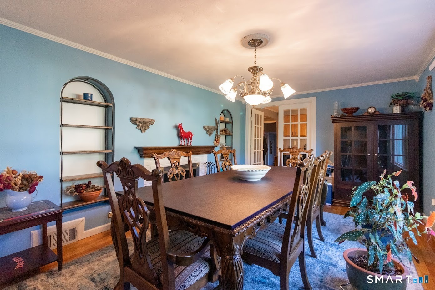 763 North Street Suffield, CT 06078 - Photo 16 of 40 a view of a dining room with furniture and wooden floor