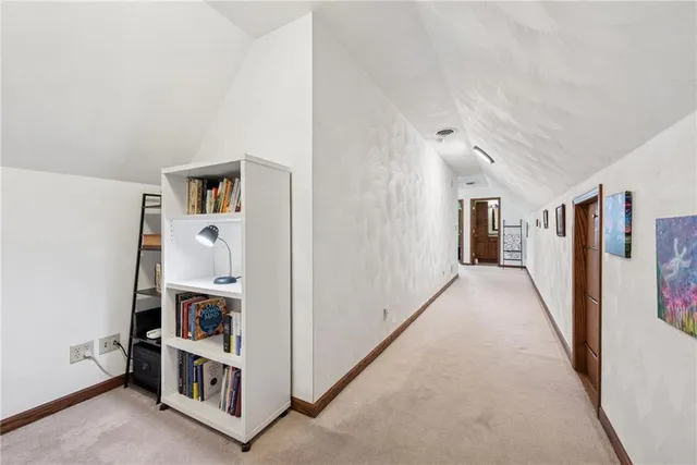 a workspace with furniture and a window