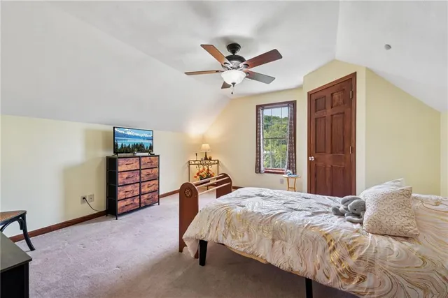 a view of livingroom with furniture and a window