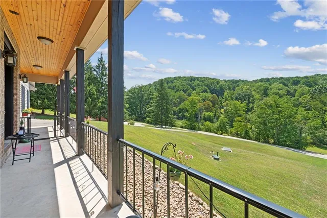 a view of a balcony with lake view and a ocean view