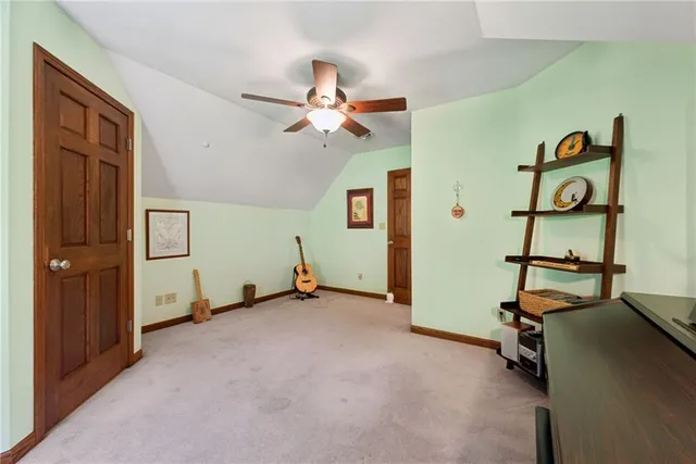 a bedroom with a bed and dresser