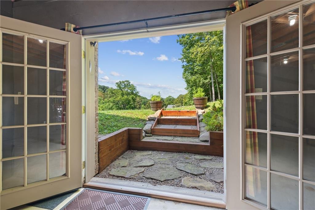 1661 Piper Road Ligonier, PA 15658 - Photo 36 of 48 Convenient French doors to side yard, lower level