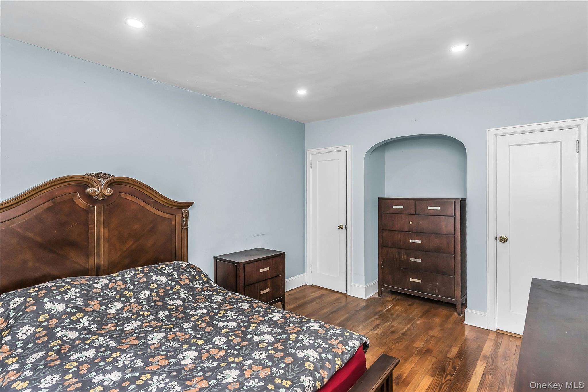 103 Union Street Valley Stream, NY 11580 - Photo 10 of 19 a bedroom with a bed and a dresser