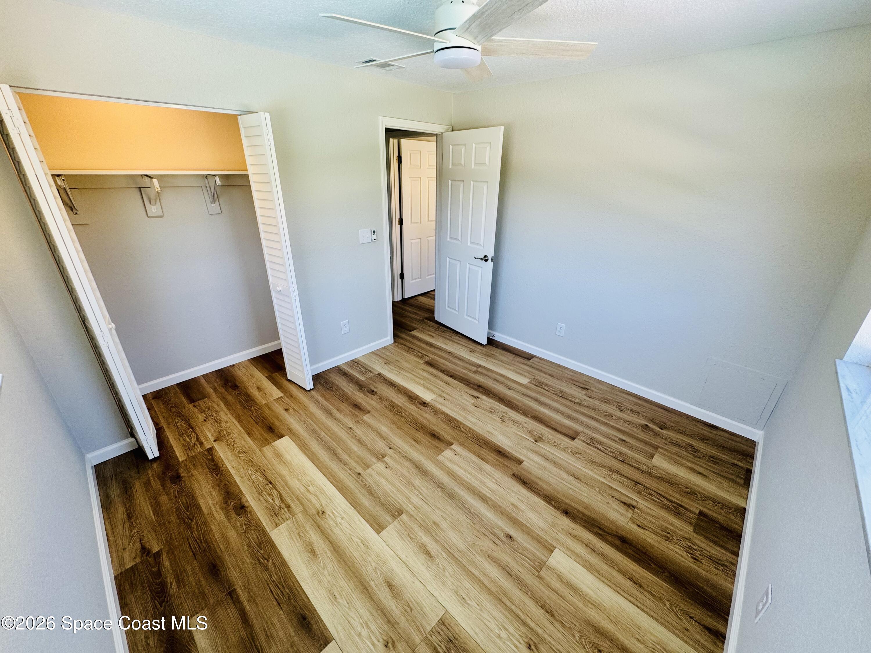 1910 Tallridge Road Melbourne, FL 32935 - Photo 17 of 34 Back room from pool corner window