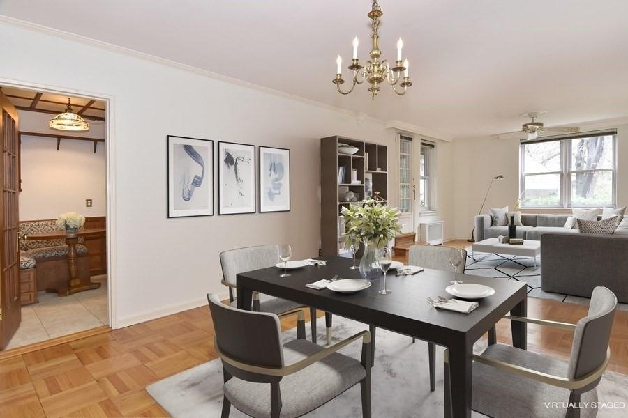 65 Durham Road, Unit 1E Bronxville, NY 10708 - Photo 1 of 1 a view of a dining room with furniture window and wooden floor