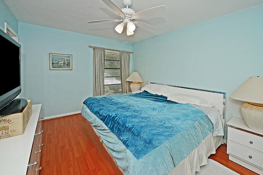 6989 Tiburon Circle, Unit 116 Boca Raton, FL 33433 - Photo 27 of 31 Master Bedroom