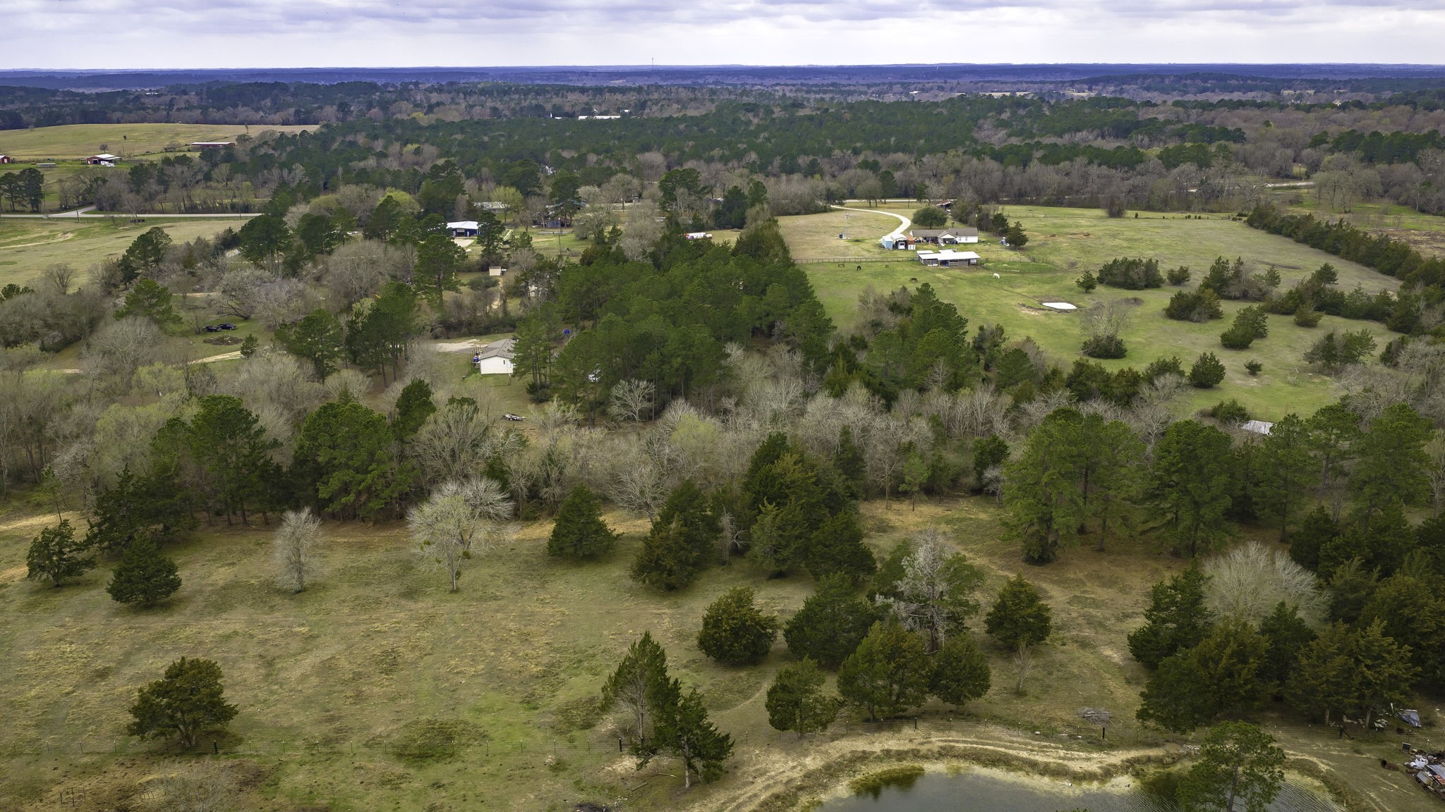 24784 Bailey Grove Road Montgomery, TX 77356 - Photo 16 of 25 a view of a lake with mountains in the background
