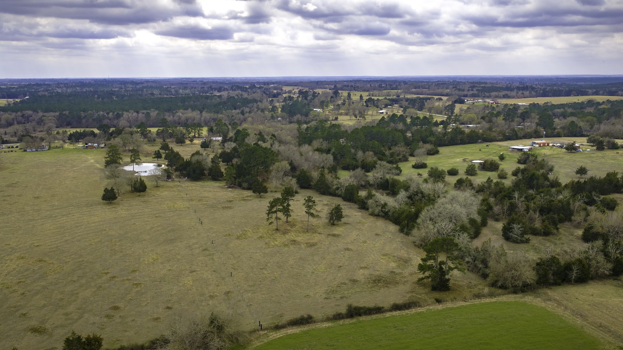 24784 Bailey Grove Road Montgomery, TX 77356 - Photo 7 of 25 a view of a lake with a mountain in the background