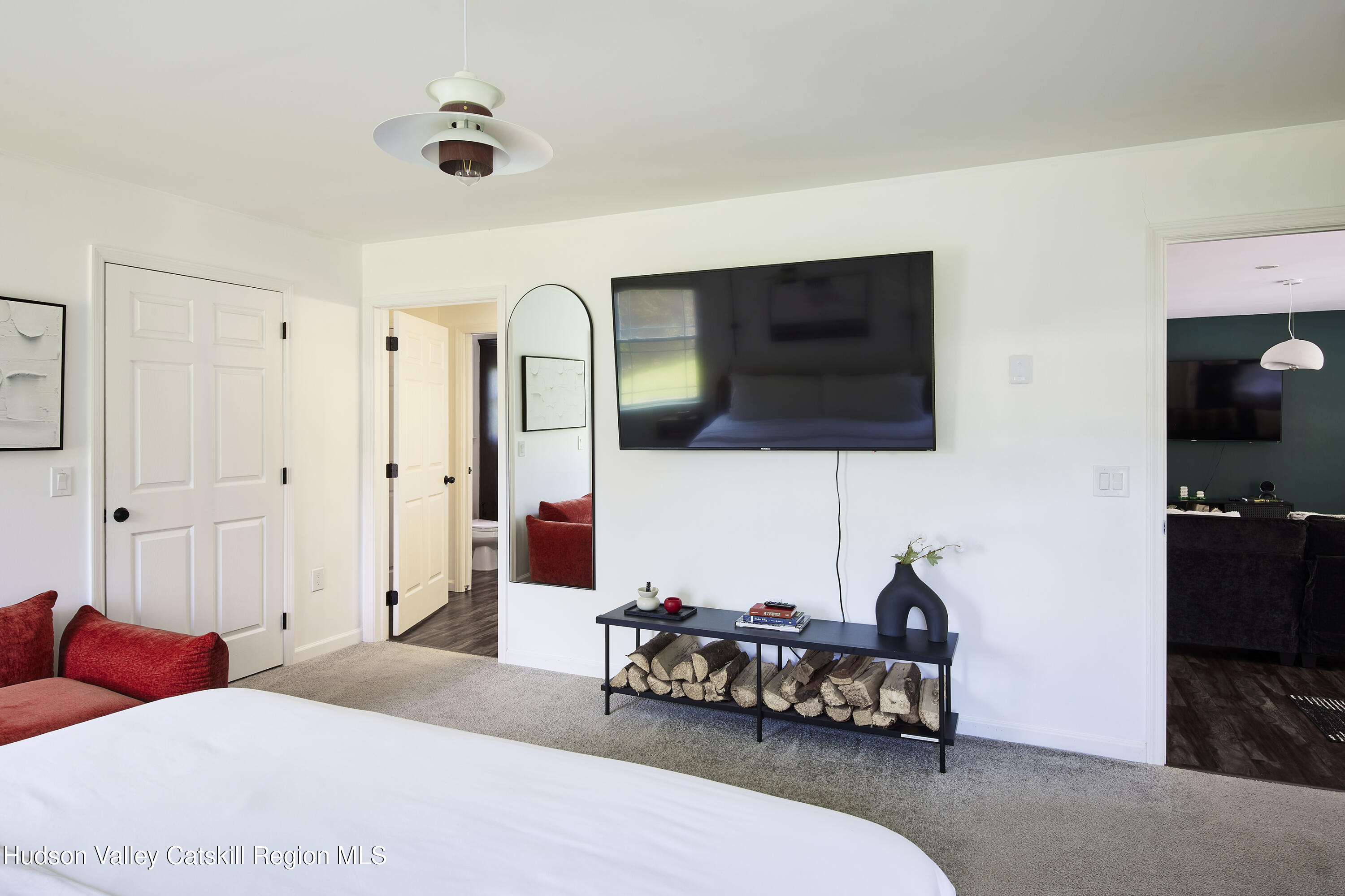 55 Hunter Road Parksville, NY 12768 - Photo 13 of 35 a bedroom with bed and a flat tv screen