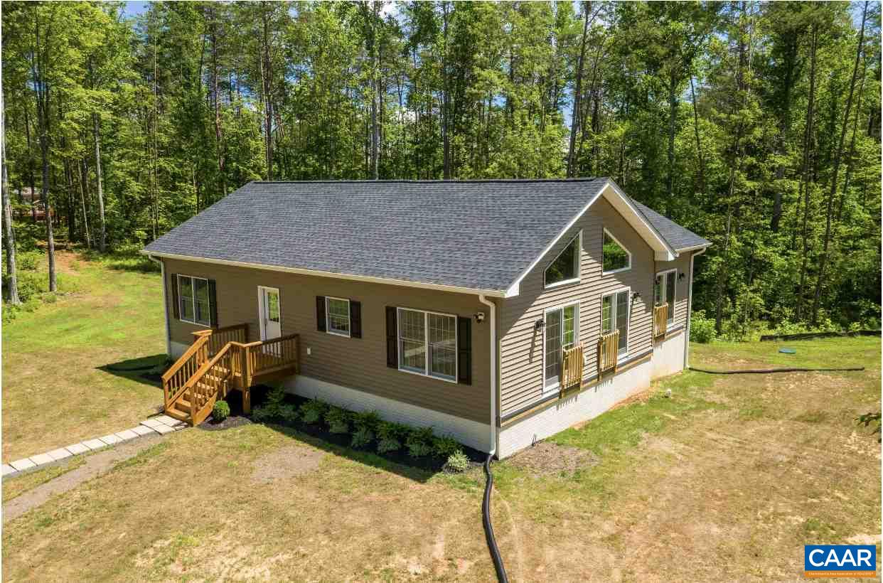 3564 Ridgeview Road Reva, VA 22735 - Photo 11 of 50 a front view of a house with a yard table and chairs