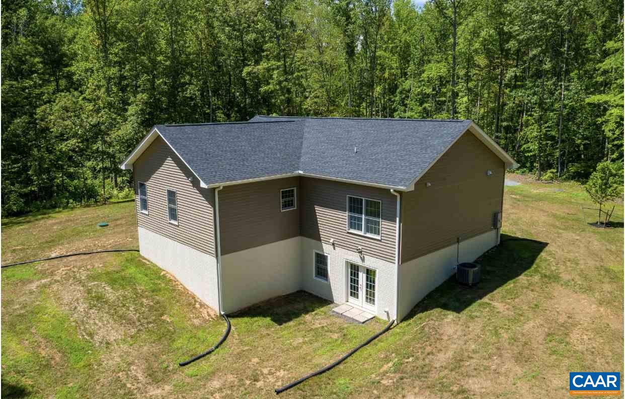 3564 Ridgeview Road Reva, VA 22735 - Photo 14 of 50 a front view of a house with a garden