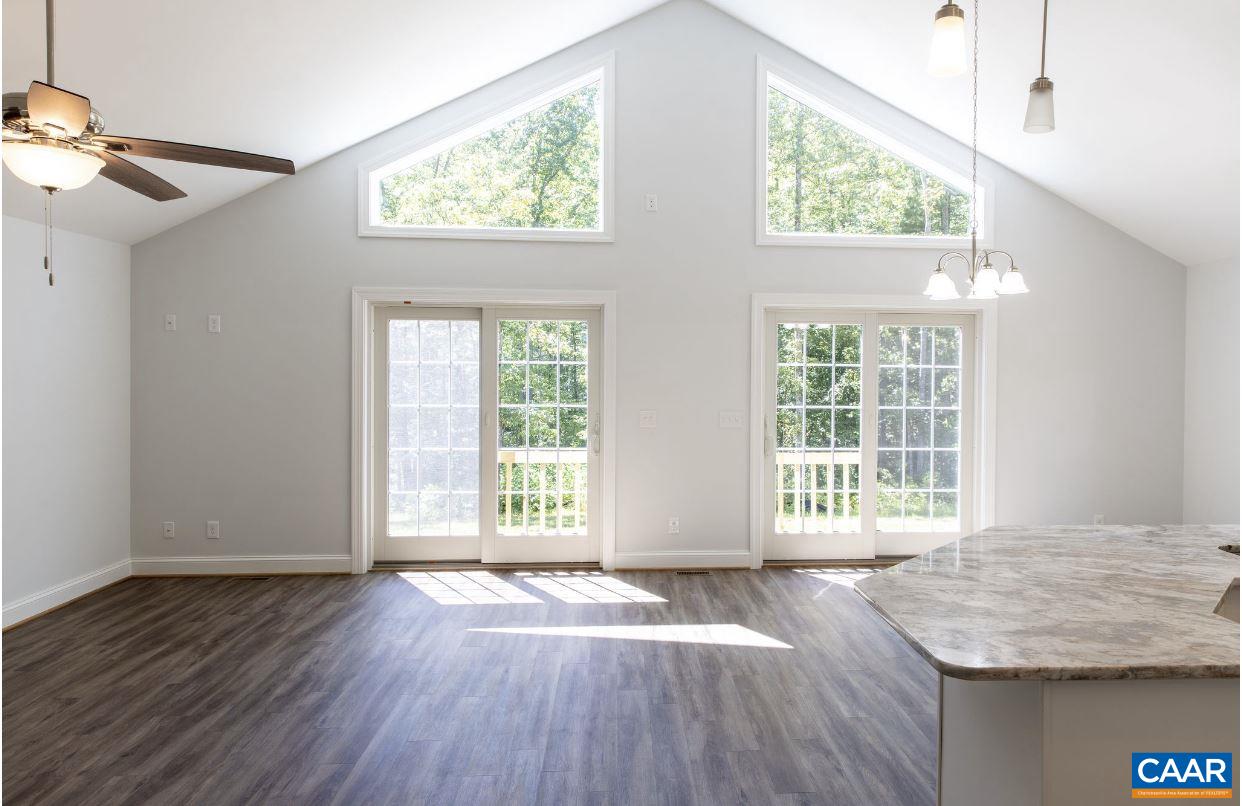 3564 Ridgeview Road Reva, VA 22735 - Photo 35 of 50 an empty room with wooden floor and windows