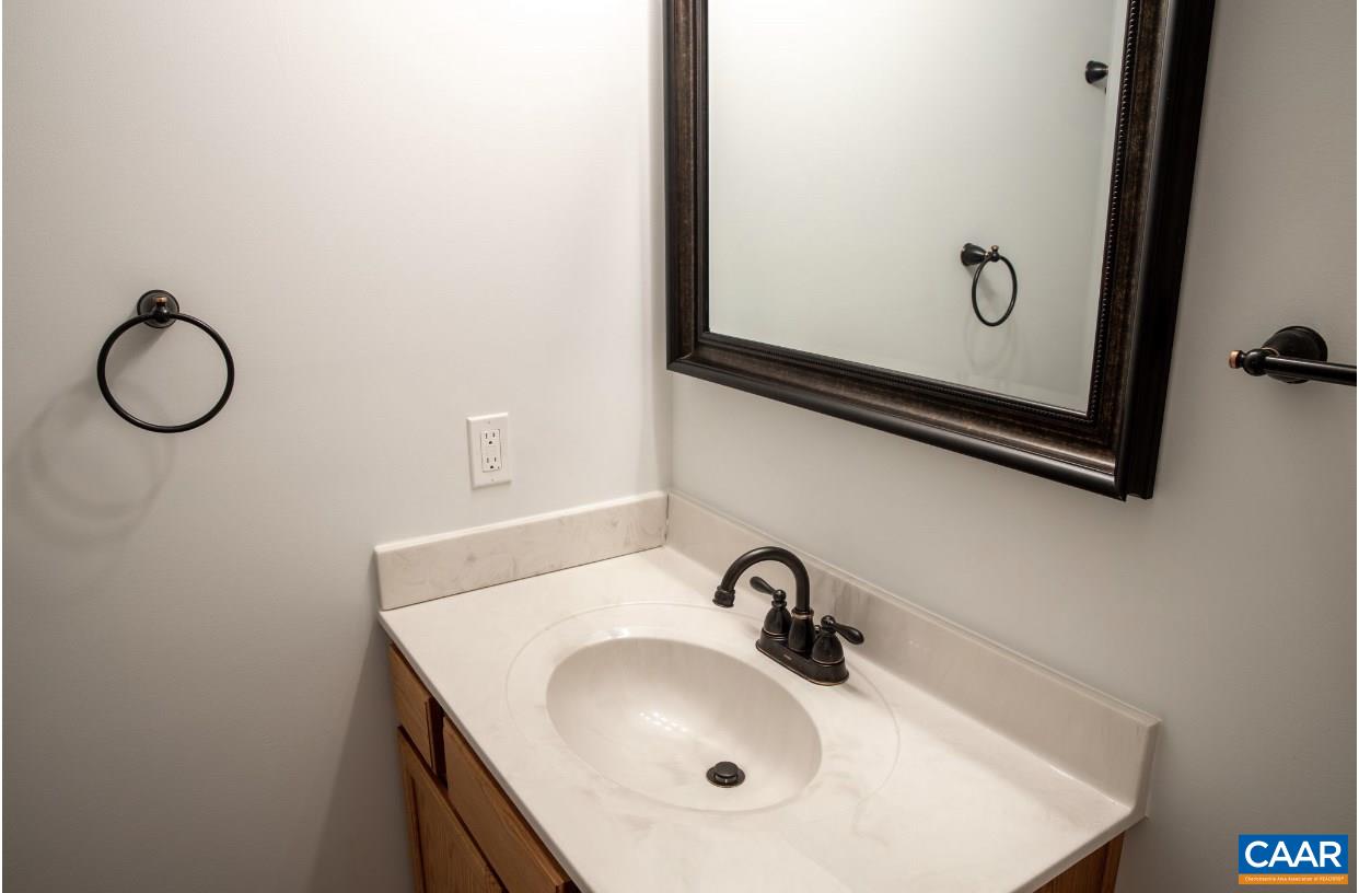 3564 Ridgeview Road Reva, VA 22735 - Photo 36 of 50 a bathroom with a sink and a mirror