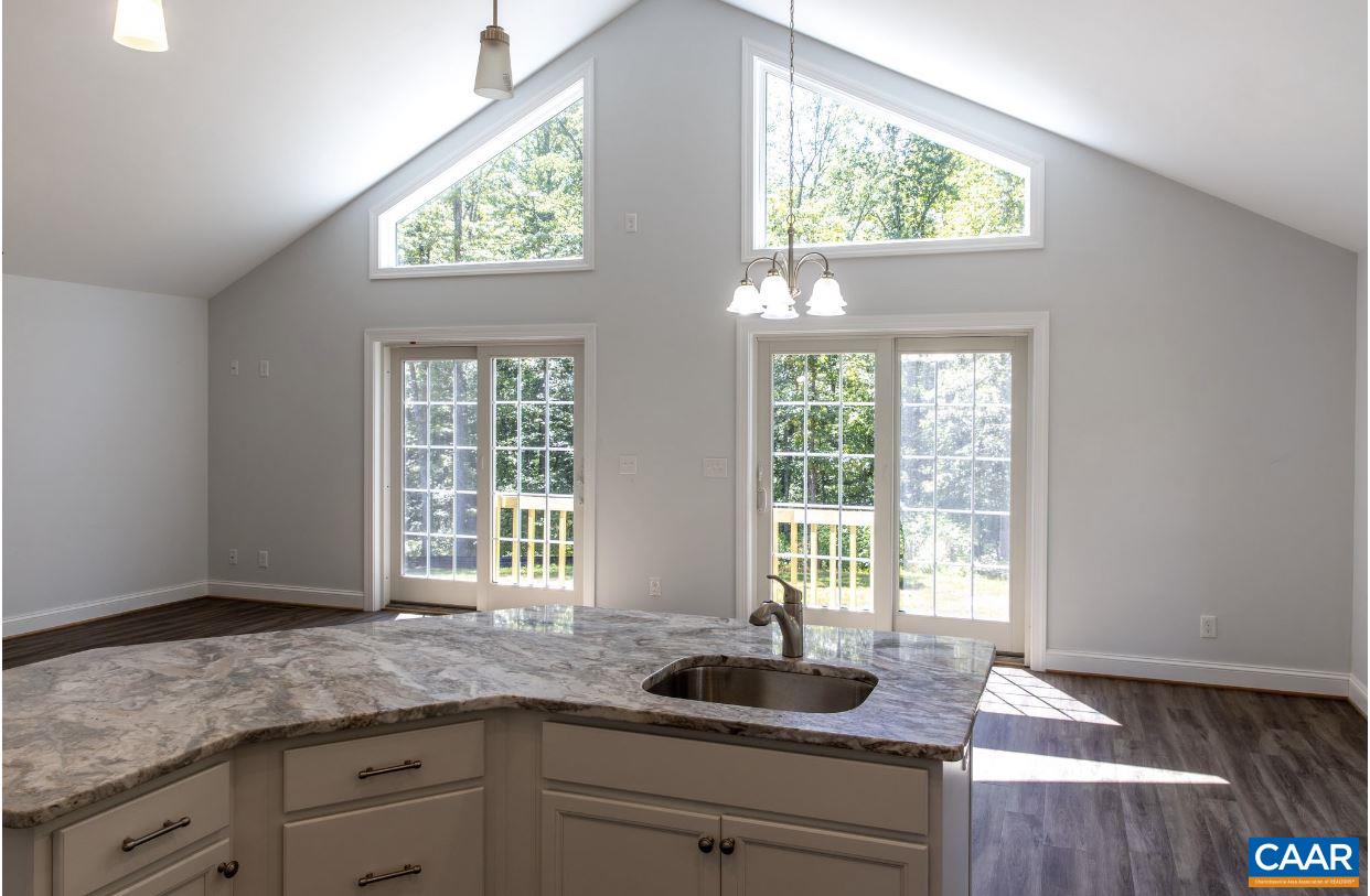 3564 Ridgeview Road Reva, VA 22735 - Photo 37 of 50 a kitchen with granite countertop a sink and a window