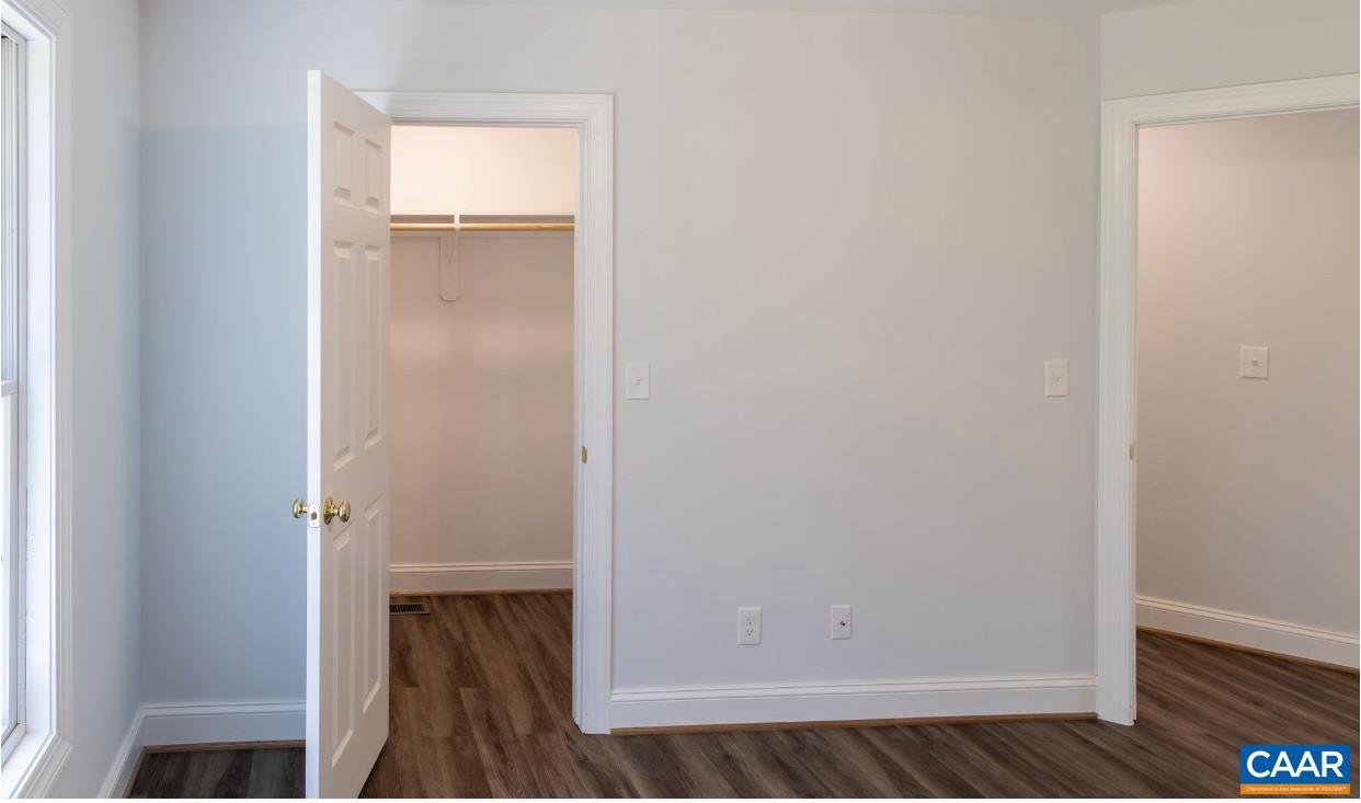 3564 Ridgeview Road Reva, VA 22735 - Photo 40 of 50 a view of walk in closet with wooden floor