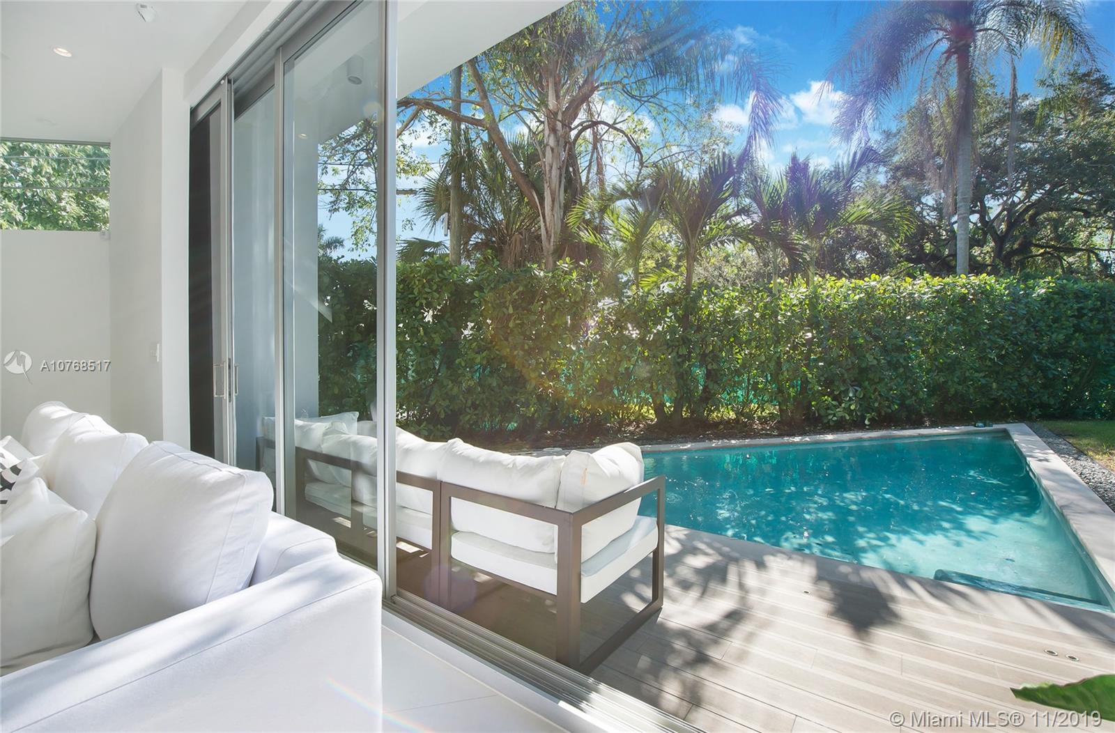 4080 Ensenada Avenue Miami, FL 33133 - Photo 14 of 20 a outdoor living space with furniture and garden view