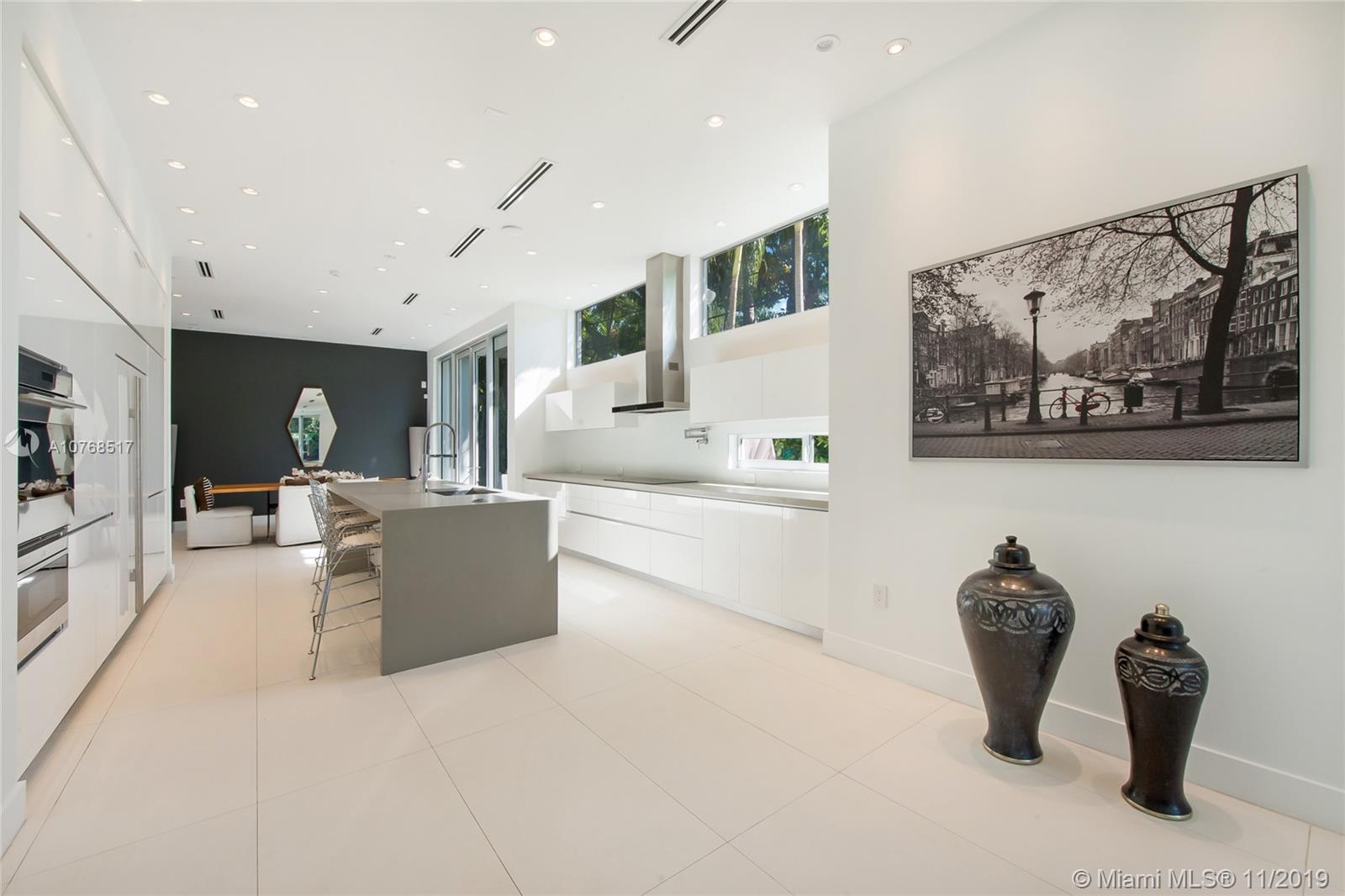 4080 Ensenada Avenue Miami, FL 33133 - Photo 3 of 20 a living room with furniture